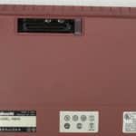 Zespodu a otevřená krytka pro dokovací stanici - Olivetti Echos 44 Color